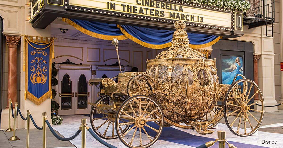 Cinderella’s sparkling gold carriage shines before the theater marquee, a dazzling new Disney’s Hollywood Studios limited-time attraction.