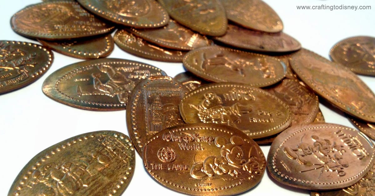 Collectible Disney World pressed pennies with character engravings, a must-have souvenir for park fans and Disney enthusiasts.