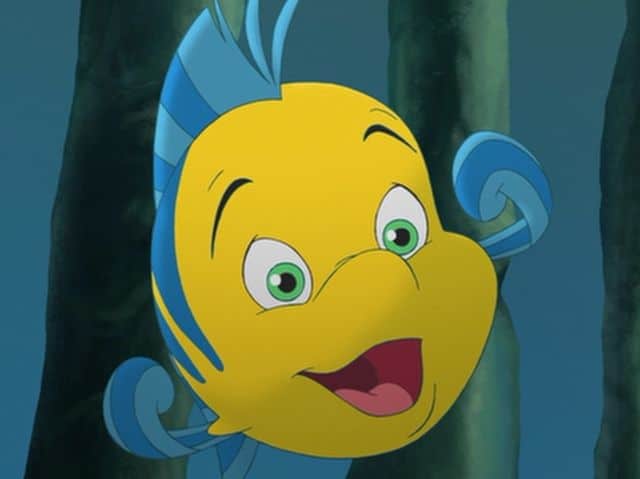 Flounder from The Little Mermaid, beaming underwater in his signature yellow and blue—ideal for Disney fans and quiz lovers.