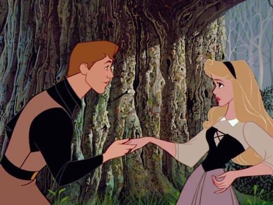 A storybook prince holds a surprised princess’s hand by a giant tree, echoing beloved Disney park fairytale moments.