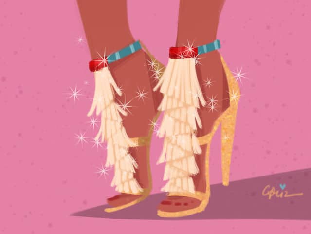 Disney Princess-inspired high-heeled sandals with sparkling tassels and blue-red ankle straps on pink, fit for a day at Disneyland.