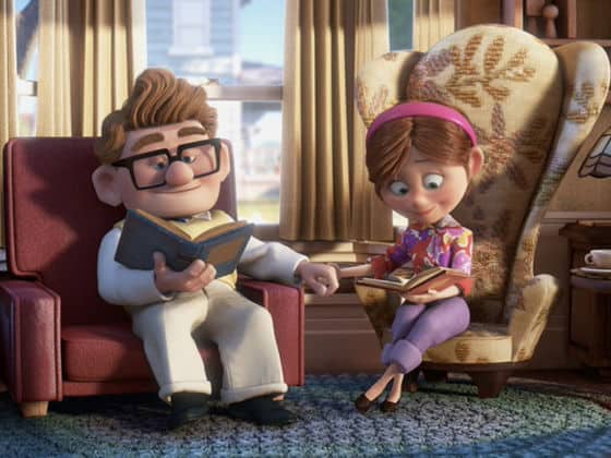Goofy relaxes on a couch with a book, playfully contemplating Disney couples as if taking a lively Disney romance quiz.