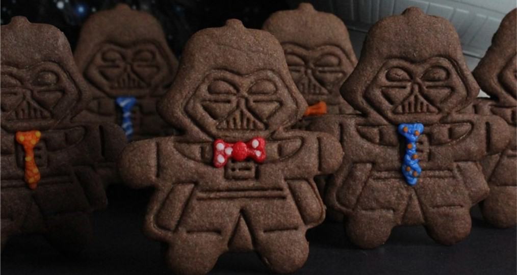 Darth Vader-shaped Star Wars cookies at Galaxy’s Edge, decked with bright icing ties and bow ties for a themed treat.