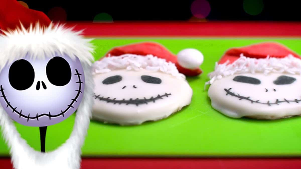 Jack Skellington dons his Santa hat beside two matching cookies, capturing Nightmare Before Christmas holiday magic.