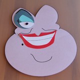 A cartoonish face resembling Ursula sits on display, evoking Disney Villains vibes and perfect for your next DIY at-home craft night.