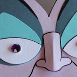 Whimsical Ursula-inspired face with blue eyelids, purple gem eyes, and a sculpted nose—ideal for Disney Villains fans.