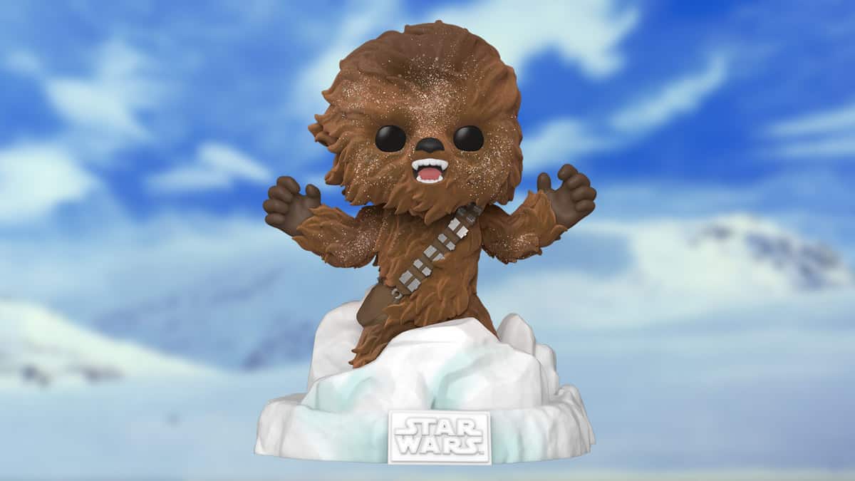 Chewbacca from Star Wars stands as a Funko Pop! on snowy ground, celebrating 40 years under clear blue skies and clouds.