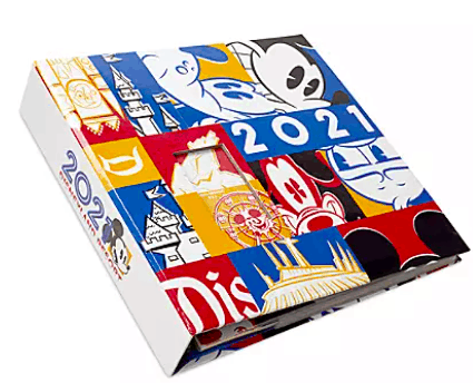 Vibrant Disney 2021 scrapbook binder from the 2021 Collection showcases Mickey Mouse and magical castle artwork on both the cover and spine, making it an ideal keepsake for capturing unforgettable moments at the Disney Parks or ringing in the New Year with fan-favorite characters.