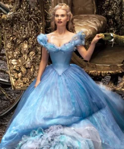 Cinderella in her sparkling blue ball gown stands beside her golden carriage at the park, looking astonished—capturing the enchanting magic of Disney’s beloved princess and inspiring magical Halloween memories.