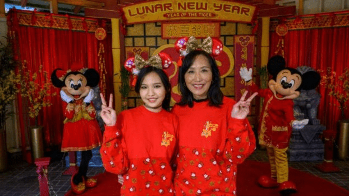 Mickey and Minnie with guests during Lunar New Year at Disney California Adventure
