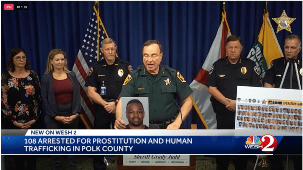 Polk County Sheriff Judd with a picture of Xavier Jackson