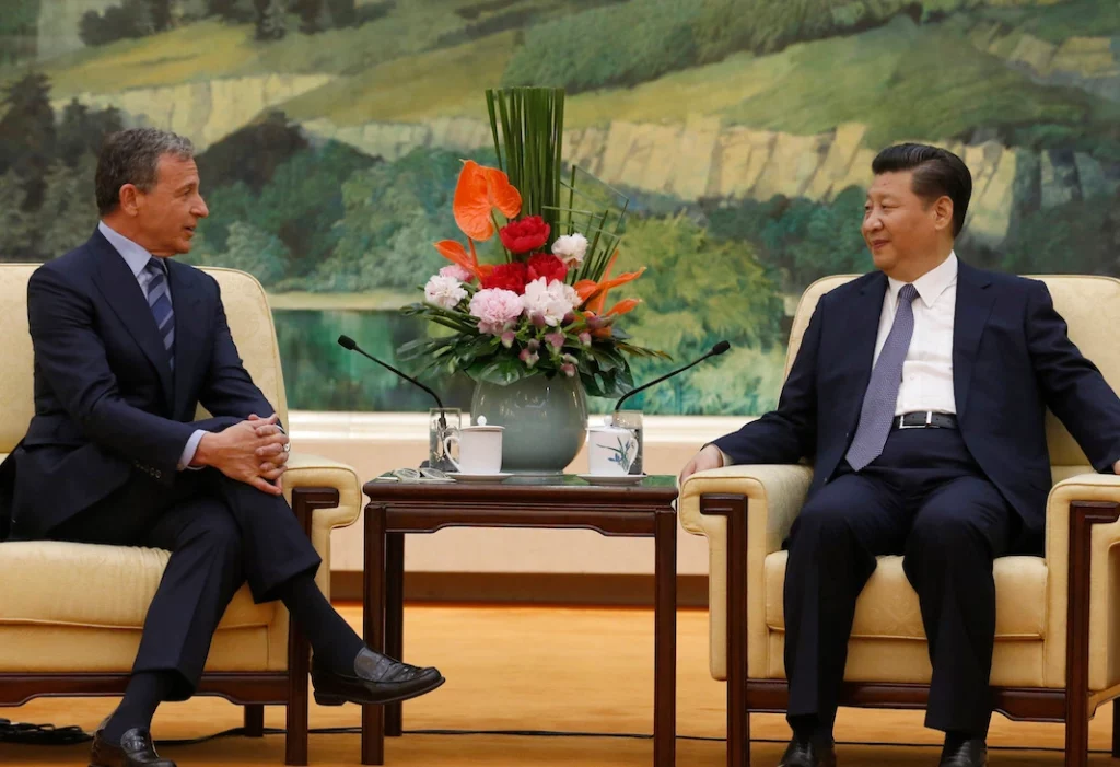 Bob Chapek (left); CCP President Xi Jingping (right)