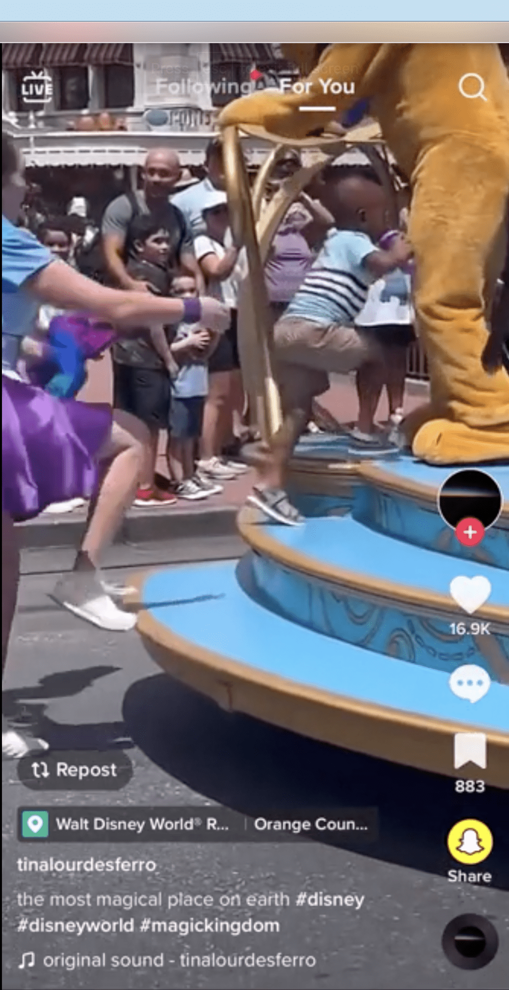 Kid climbs parade float