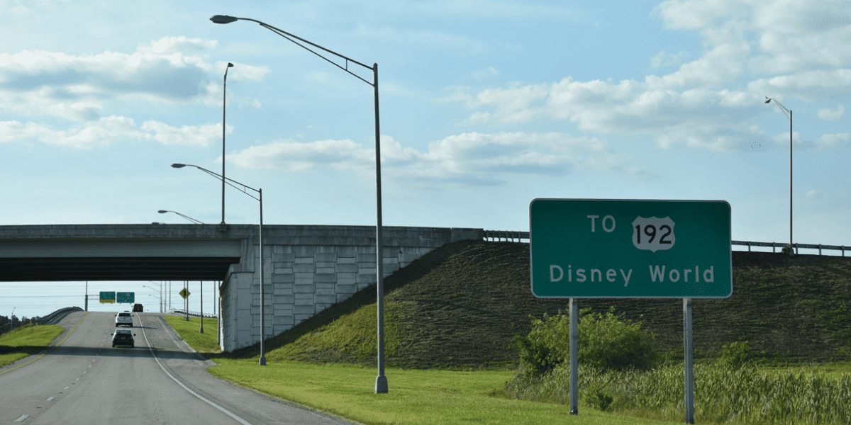 Sign on Highway leading to Disney World