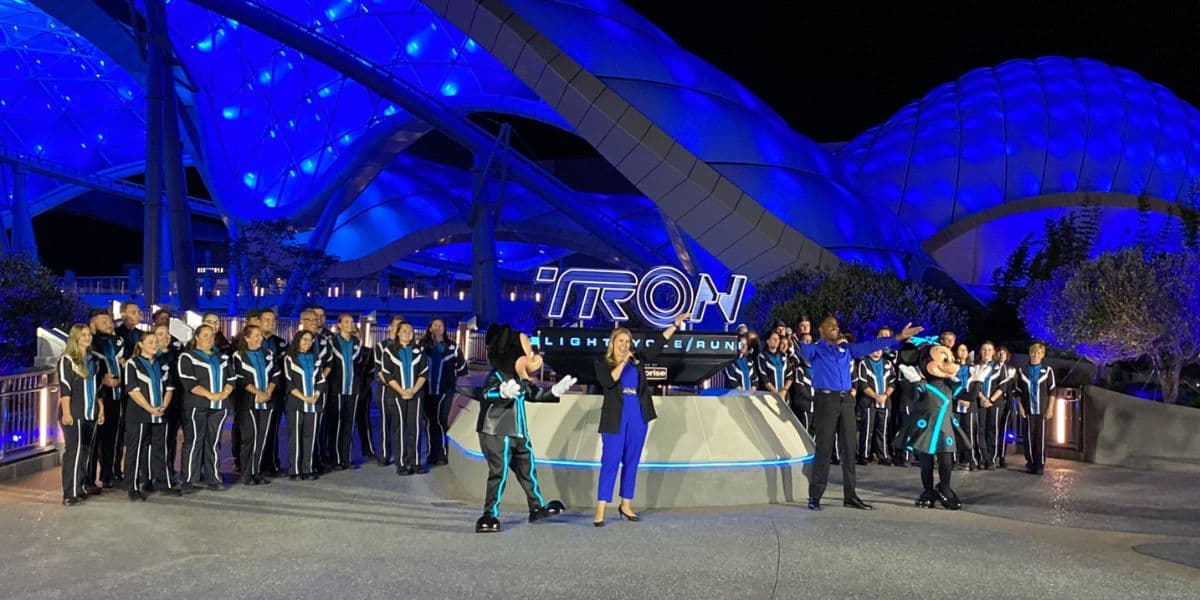 TRON cast members and mickey during ride opening