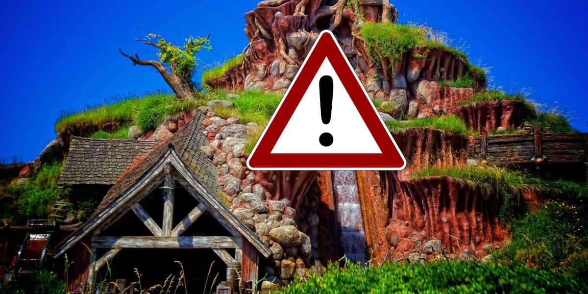 disneyland splash mountain with hazard symbol