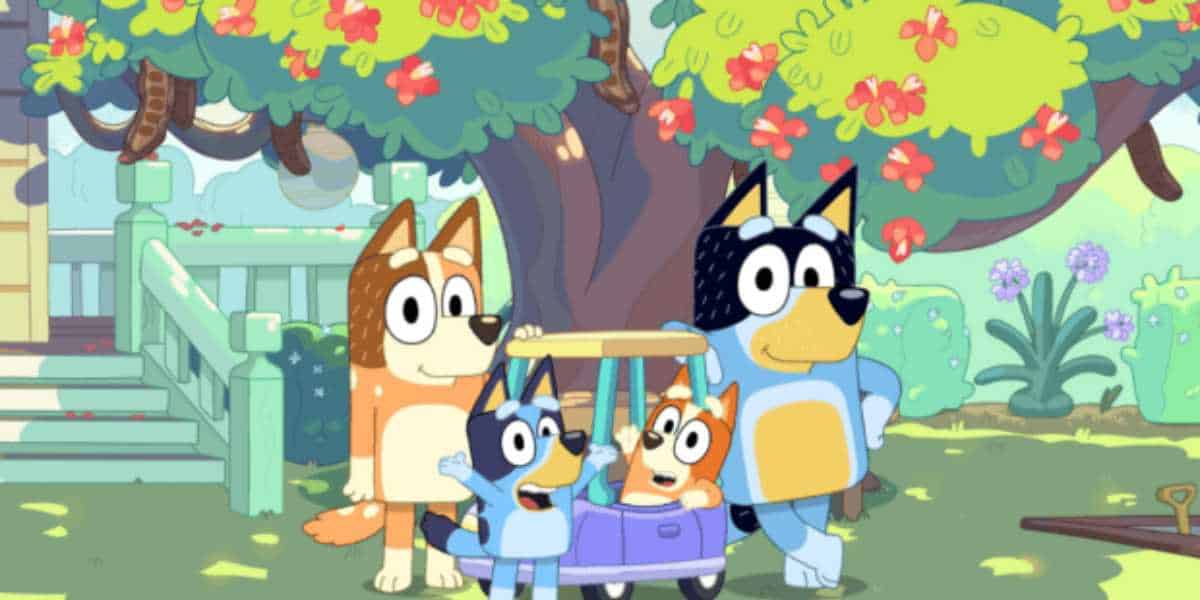 Bluey image with an apple tree behind them