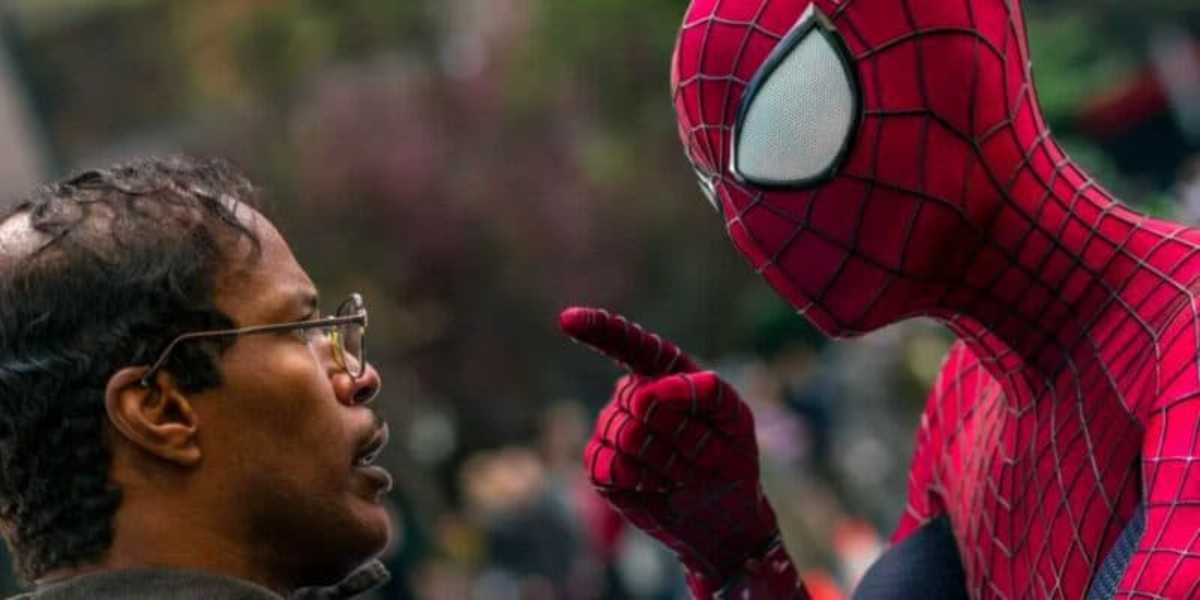 Spider man pointing to a guy