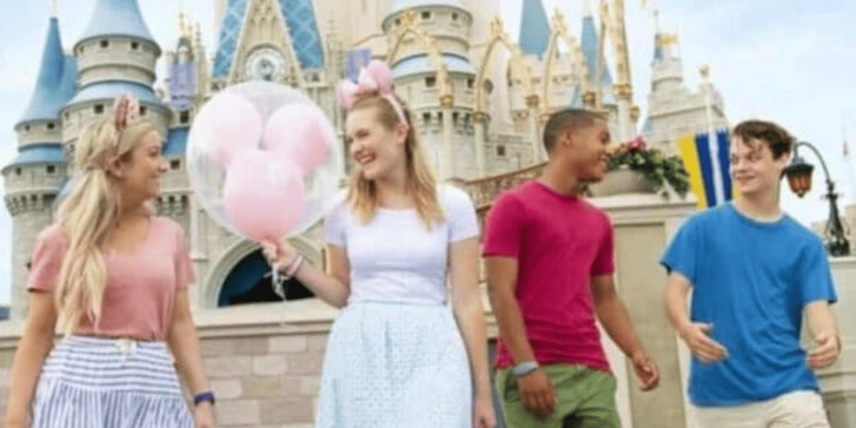 Teenagers with balloon at Disney World
