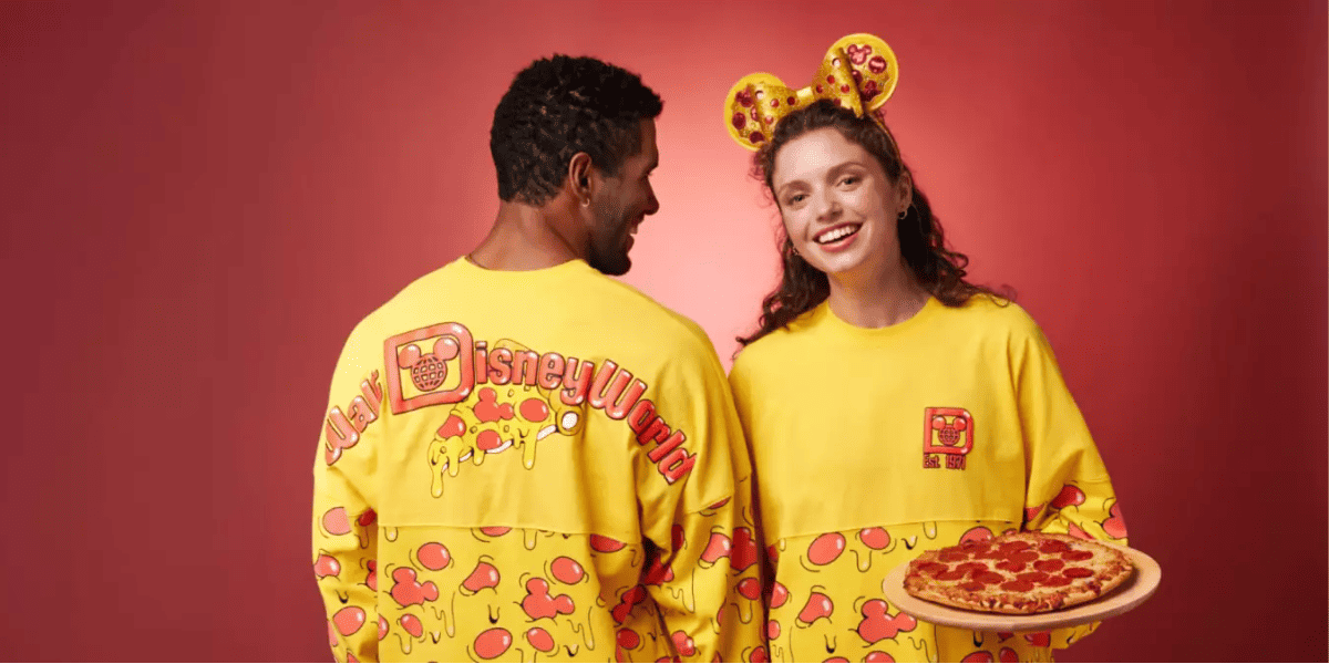 guests wearing pizza inspired disney merchandise