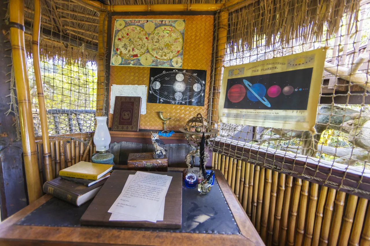 A 1938 letter from S.E.A. member Aya Kouame-Beauciel to the daughter rests on a writing stand in the treetop room of the recently reopened Adventureland Treehouse.