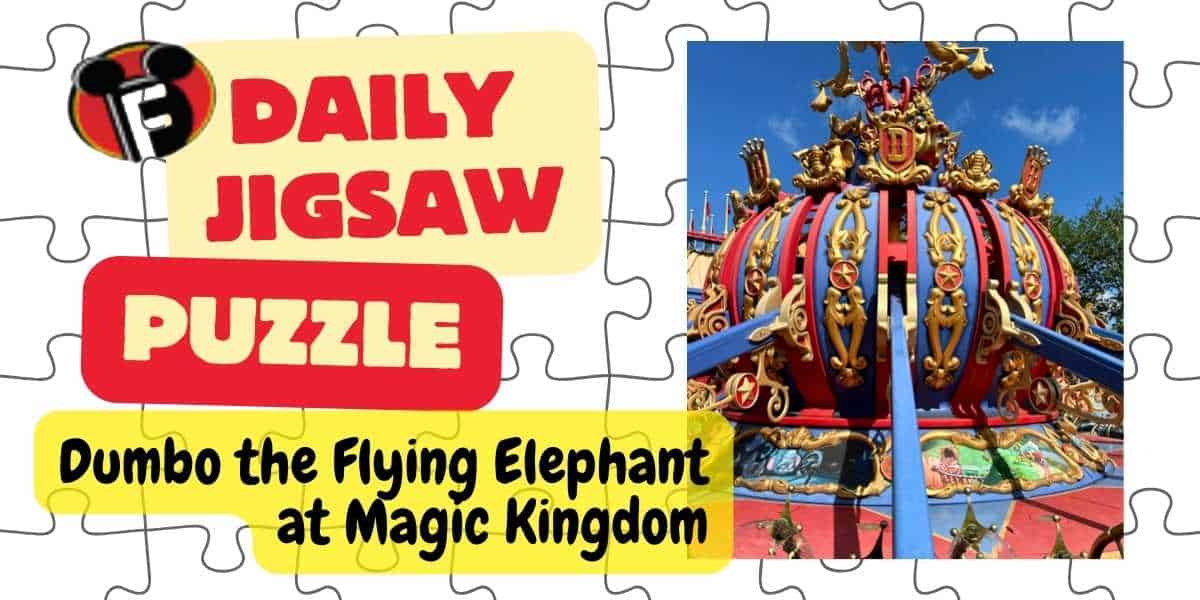 A colorful poster featuring the title "Daily Disney Jigsaw Puzzle" next to an image of Dumbo the Flying Elephant ride at Magic Kingdom. The ride's ornate, multicolored central structure with golden accents is shown. Text reads, "Dumbo the Flying Elephant at Magic Kingdom.
