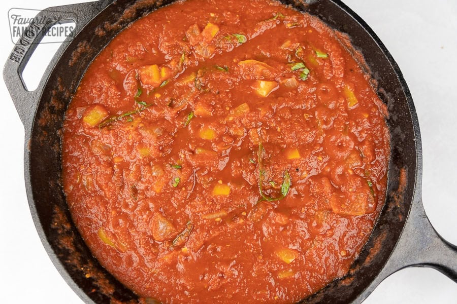 Ratatouille is the best way to enjoy fresh summer vegetables. This dish is delicious, healthy, and packed with flavor. Ratatouille sauce in a cast iron skillet.