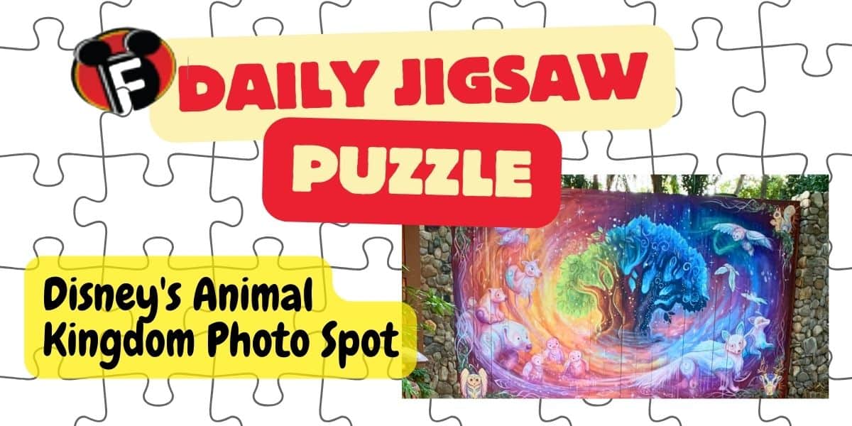 A jigsaw puzzle image with the title "Daily Jigsaw Puzzle" on a white background with puzzle piece outlines. Below is a mural from Disney's Animal Kingdom featuring vibrant, colorful swirls and various animals.