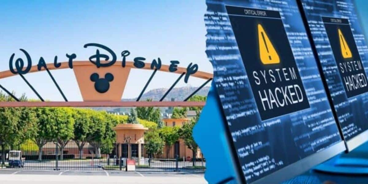 Image showing the entrance gate of Walt Disney Studios with its iconic sign and Mickey Mouse symbol on the left, and a close-up of computer screens displaying a "SYSTEM HACKED" warning on the right, suggesting a cybersecurity breach.