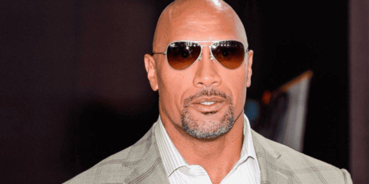 Dwayne Johnson in sunglasses.