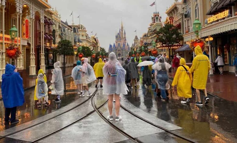 Walt Disney World Resort guests visit the Magic Kingdom during Hurricane Milton rainy weather. Disney World weather weekend