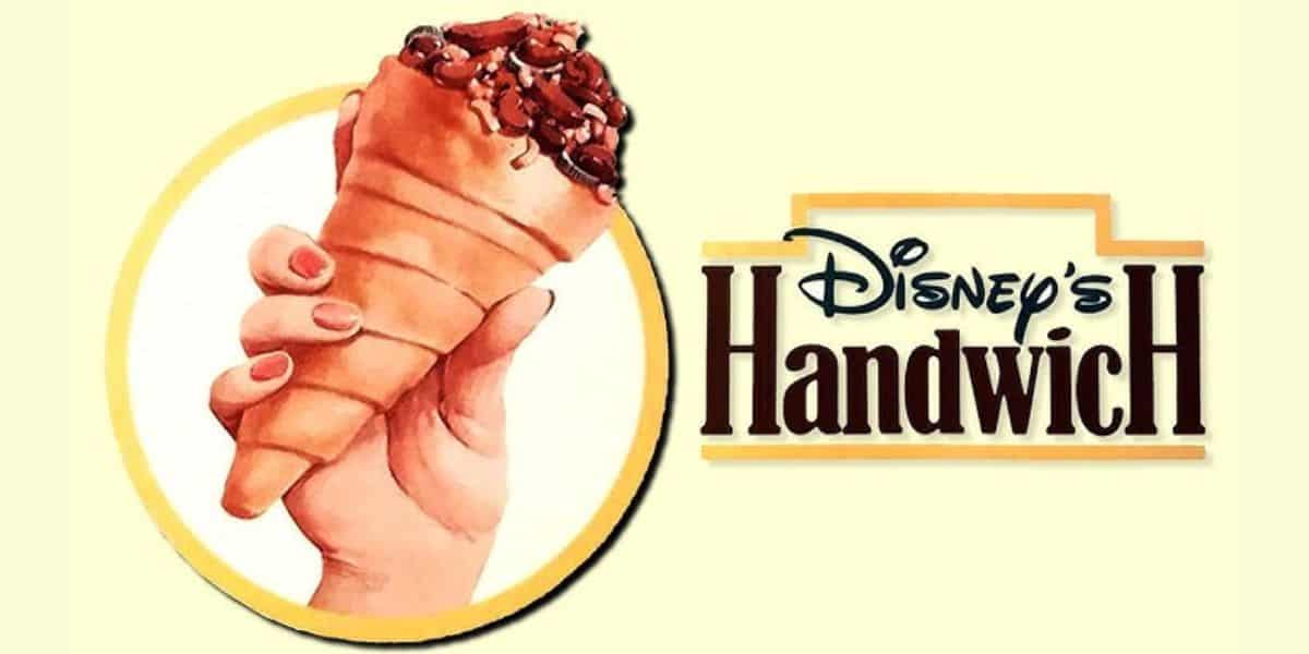 A hand holding a uniquely shaped ice cream cone filled with a chocolate and nut topping. Beside it, the text says "Disney's Handwich." The background is light yellow.