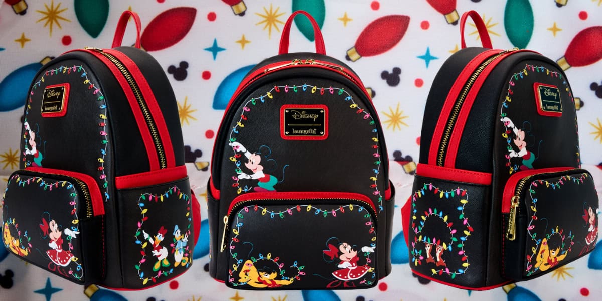 Three black Disney-themed backpacks featuring vibrant red accents and colorful character images of Mickey and Minnie Mouse with festive lights. The background shows a pattern of multicolored holiday lights and stars.