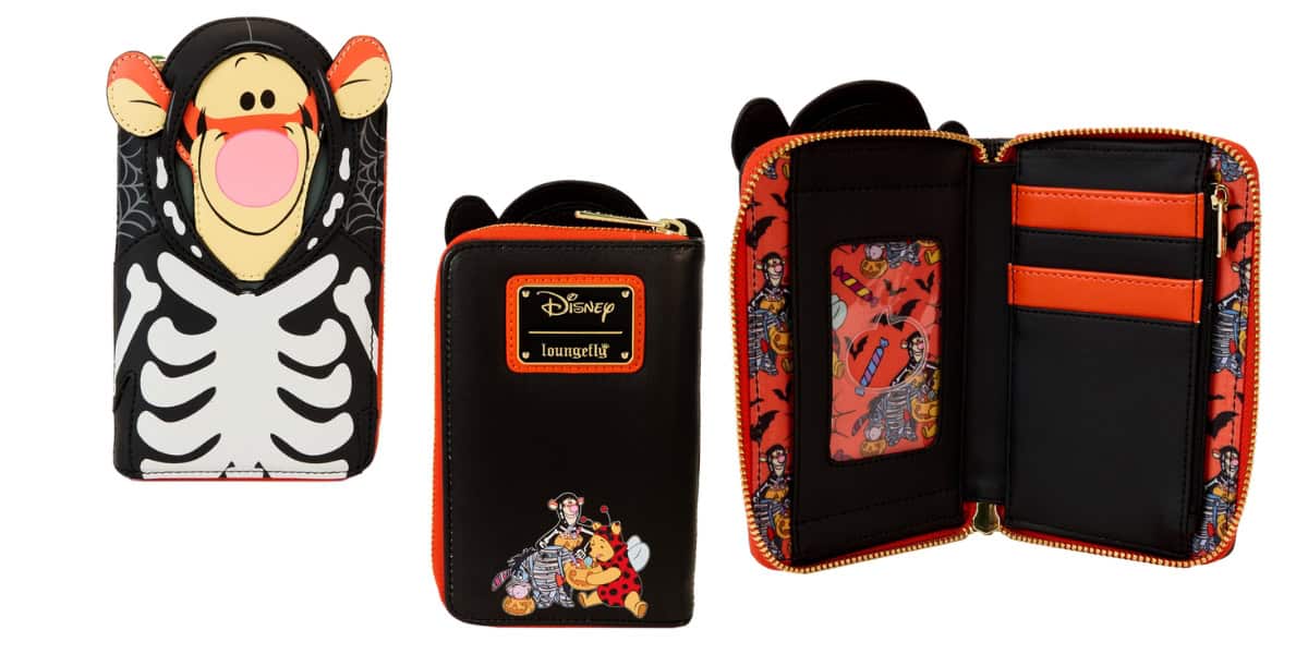 A wallet with a Tigger-themed Halloween design. The front features Tigger dressed as a skeleton, and the back shows Disney branding. The inside has a colorful pattern with card slots and ID window.