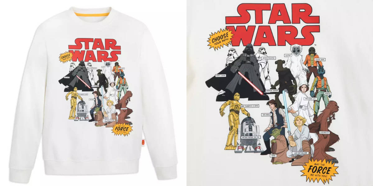 A white sweatshirt featuring a colorful "Star Wars" graphic. The design includes various characters like Darth Vader, R2-D2, C-3PO, Chewbacca, and others with speech bubbles and action poses. "Choose your side" text is also visible.