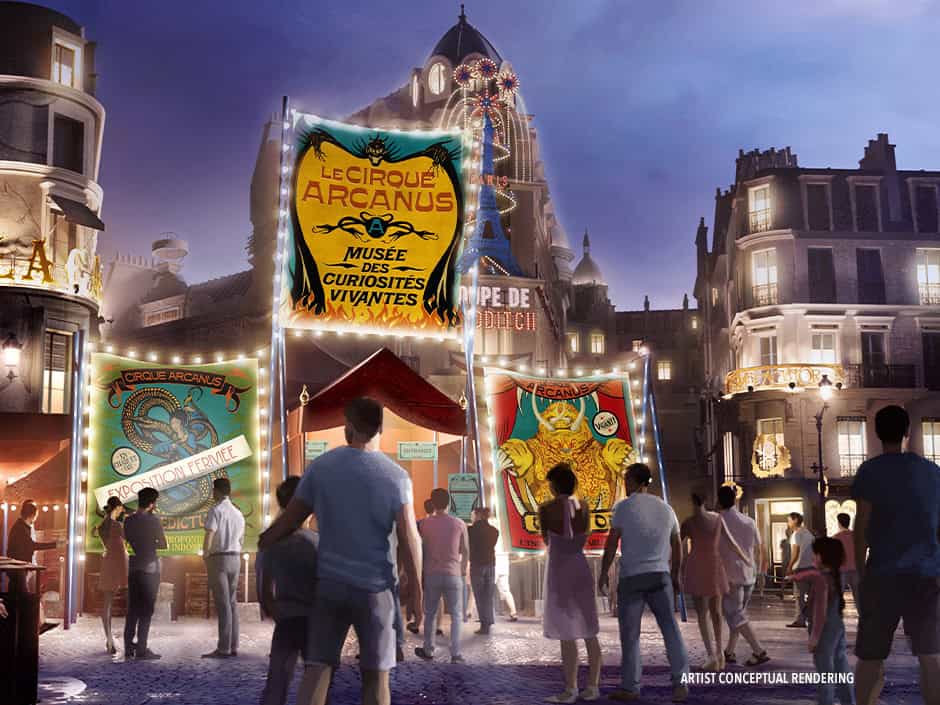 Conceptual rendering of a bustling city street at night, filled with people. Large, colorful banners advertise “Le Cirque Arcanus” and “Musée des Curiosités Vivantes." Buildings are adorned with lights, creating a vibrant atmosphere.