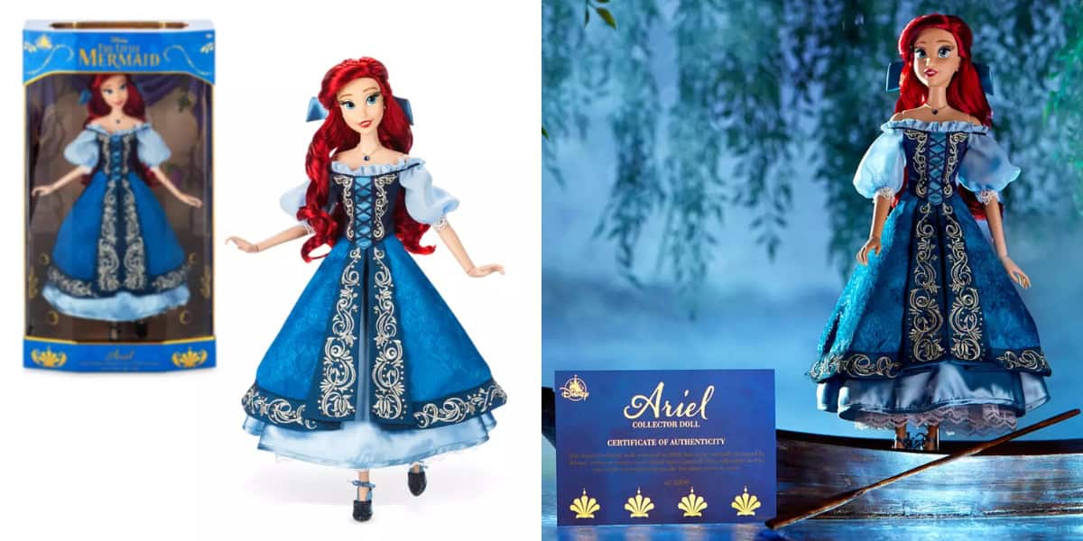 A collector doll of a red-haired princess in a detailed blue and white dress is shown inside its packaging and posed outdoors. The scene includes a certificate of authenticity lying next to the doll.