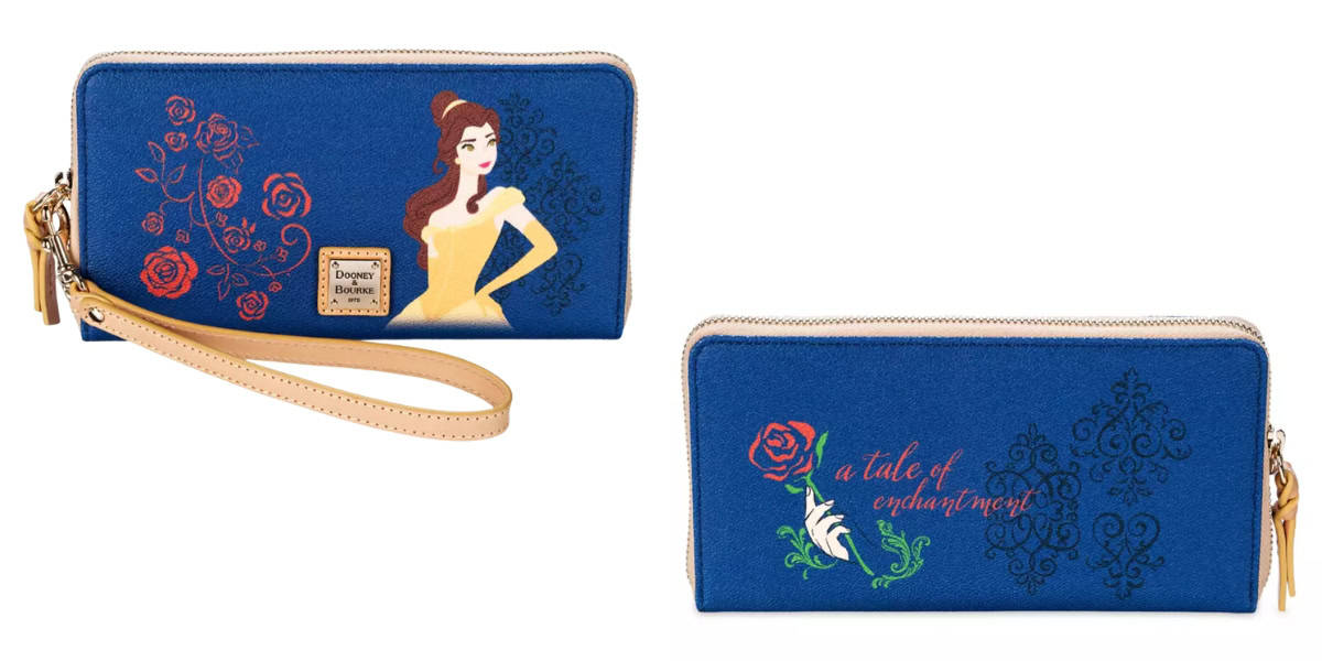 A blue wristlet with tan accents featuring an illustration of a princess in a yellow dress, decorative roses, and the text "a tale of enchantment." The design also includes swirls and floral patterns.