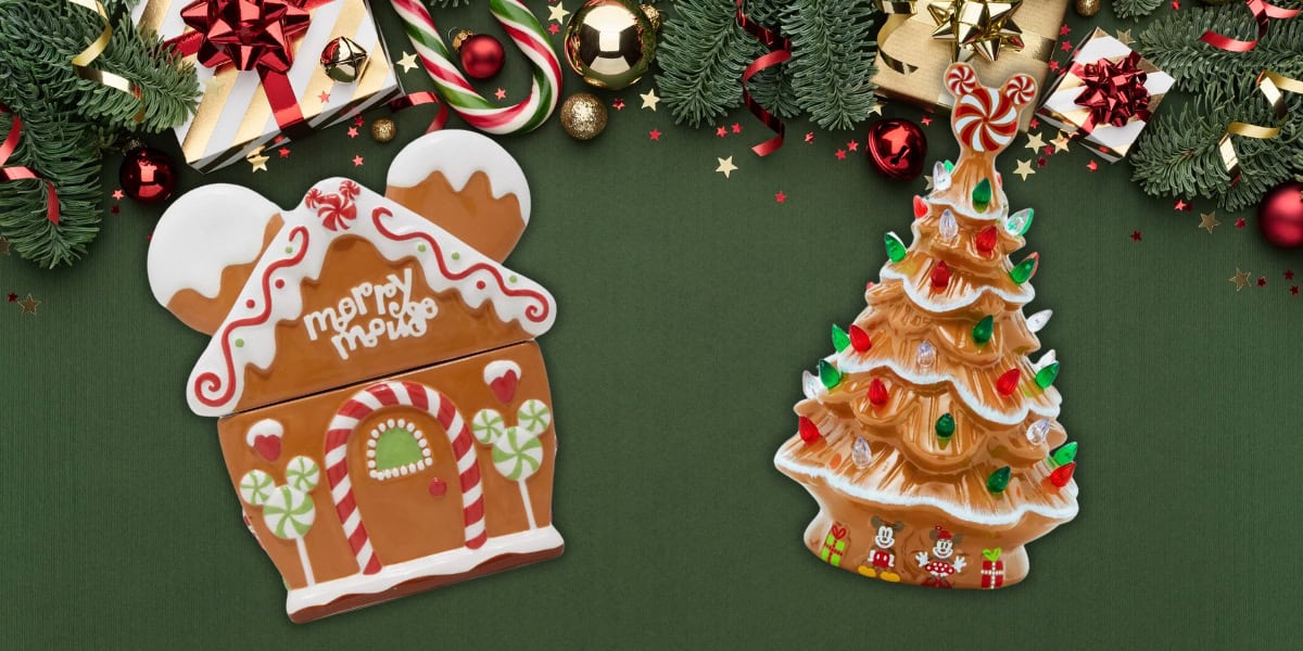 Festive image of gingerbread decorations: a house adorned with candy canes and "Merry & Happy" icing, and a Christmas tree with colorful lights and ornaments. They're set against a green background with evergreen branches, red baubles, and wrapped gifts.