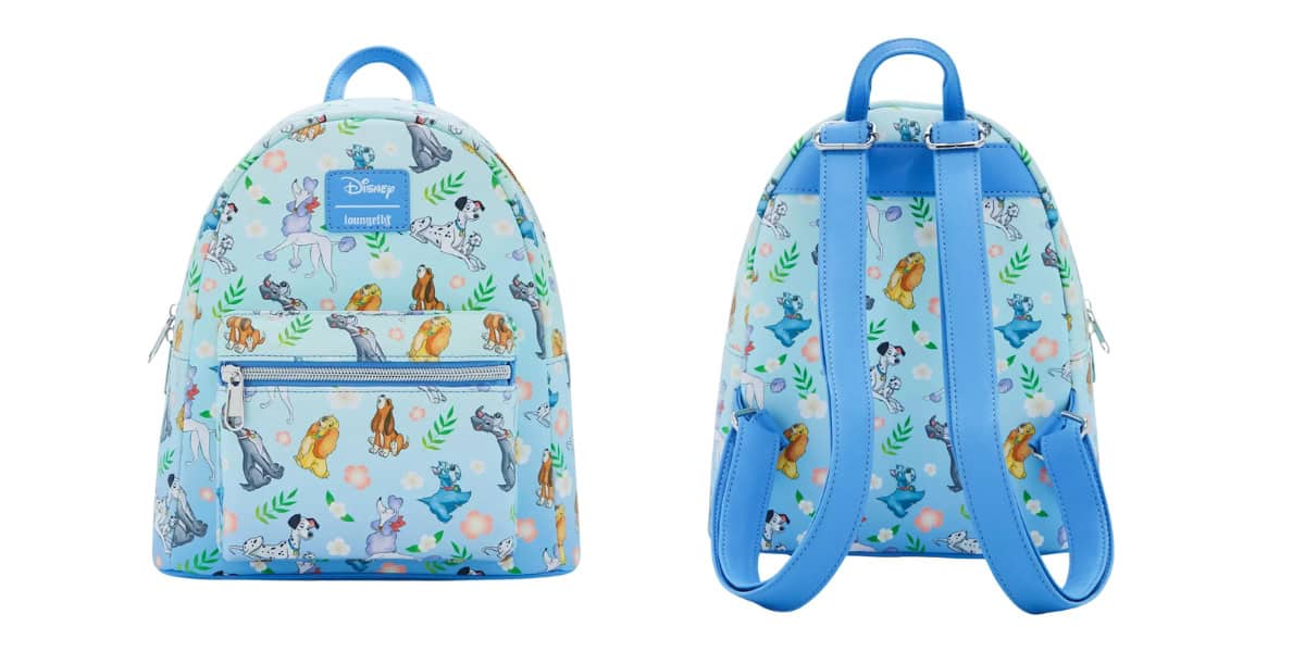 A set of two images shows a light blue backpack adorned with cartoon dog characters from Disney's "101 Dalmatians." The front view displays a zippered pocket, while the back view highlights adjustable straps and a colorful pattern.
