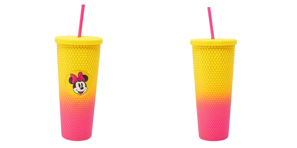 Two textured gradient tumblers transitioning from yellow to pink, each with a matching pink straw. One tumbler features a cartoon character with a pink bow, smiling face, and round ears on its side.