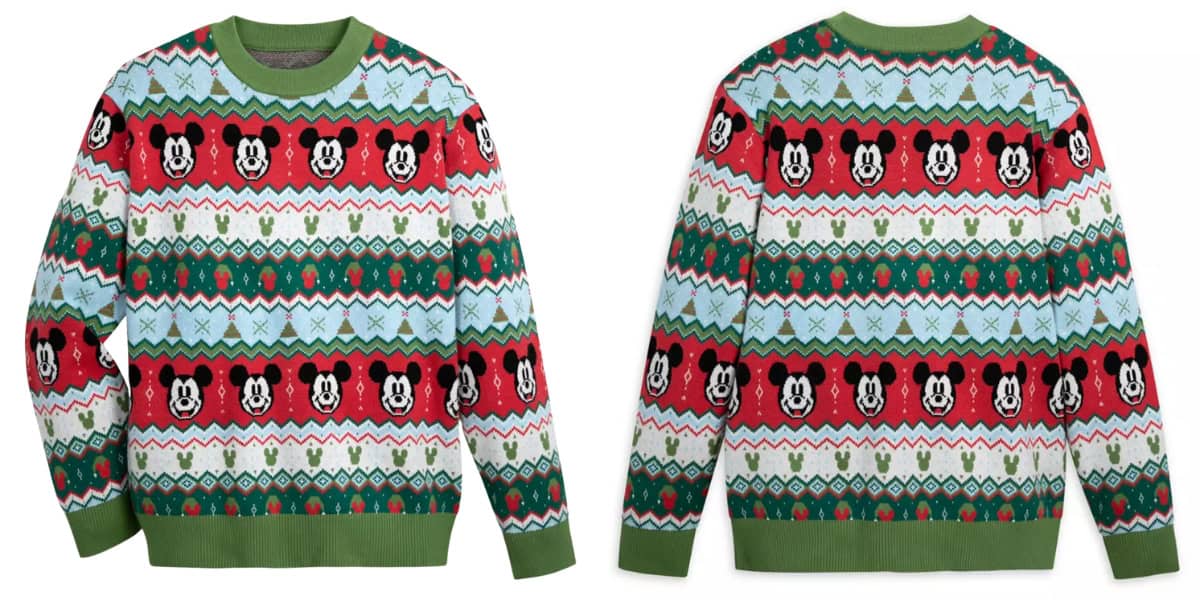 Front and back view of a festive sweater featuring a pattern with Mickey Mouse faces, snowflakes, and geometric designs in red, green, blue, and white. The sweater has a green collar, cuffs, and hem.