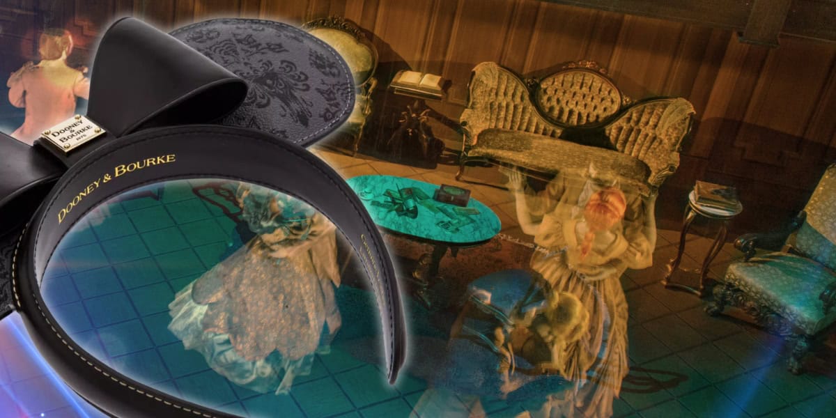 A Disney-themed black headband with a gold label lies on a reflective surface. The reflection shows an ornate living room with vintage furniture, and blurred images of two figures in period clothing dancing or moving energetically.