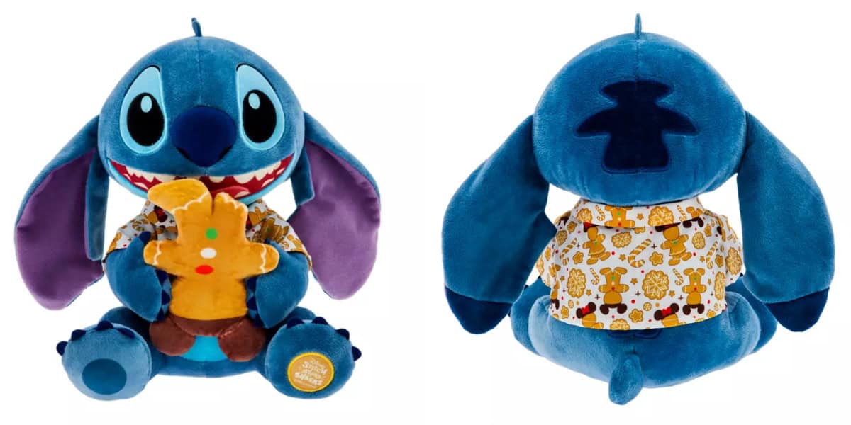 A plush toy resembling a blue alien with large ears. It holds an orange stuffed figure and wears a patterned shirt featuring cartoon animals. Two views are shown: front and back.