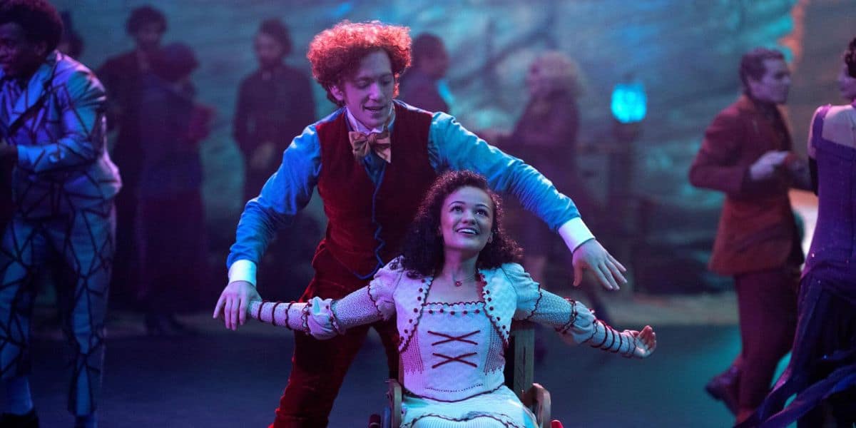 Marissa Bode as Nessarose and Ethan Slater as Boq in Wicked movie