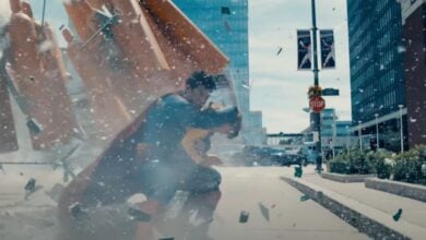 Superman (David Corenswet) saving a girl in the trailer for James Gunn's 'Superman'