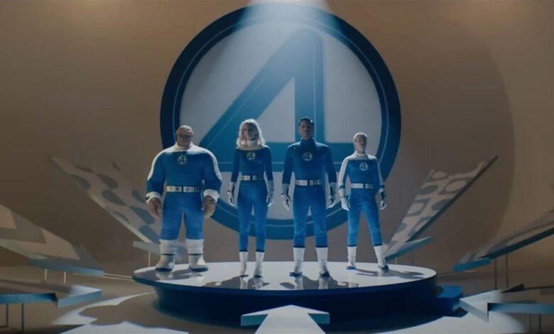 Four superheroes in blue suits with a "4" emblem stand on a round platform under a spotlight, with a large "4" logo behind them and stylized arrows pointing toward the platform, creating an iconic Fantastic Four poster scene.