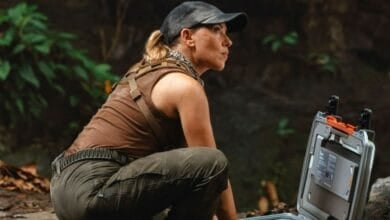 Scarlett Johansson's Zora Bennett crouching in a jungle in 'Jurassic World Rebirth'