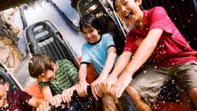 Four children riding Grizzly River Run.
