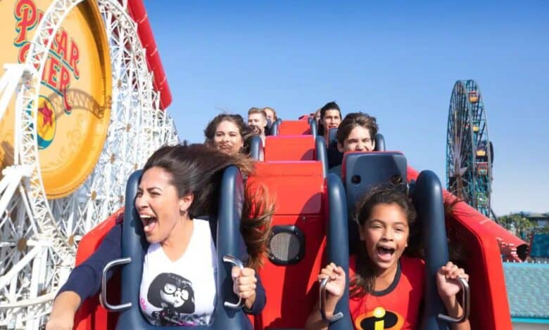 A group of excited people ride the Incredicoaster at Disney California Adventure Park.
